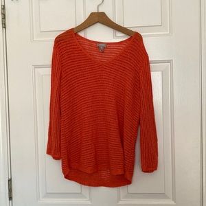 Women’s orange knit sweater